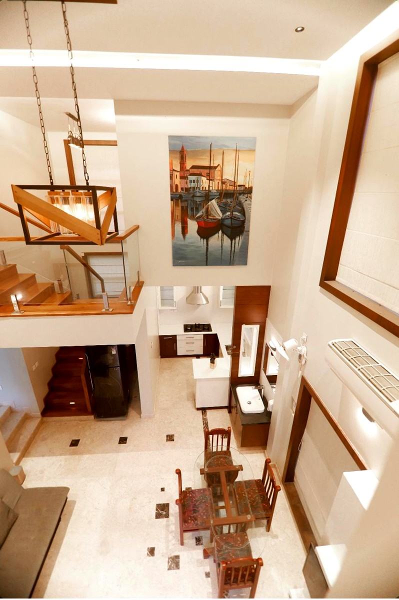 Double-height living space with staircase