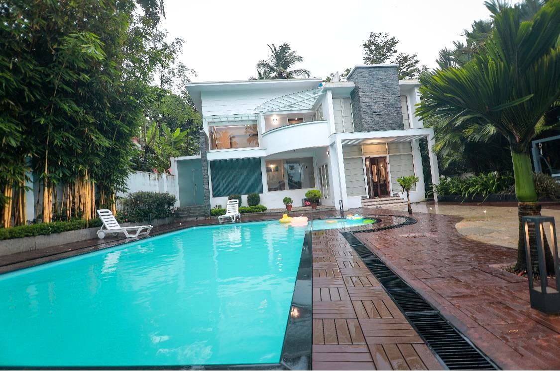 Square Villa Resort whitewashed facade with private pool